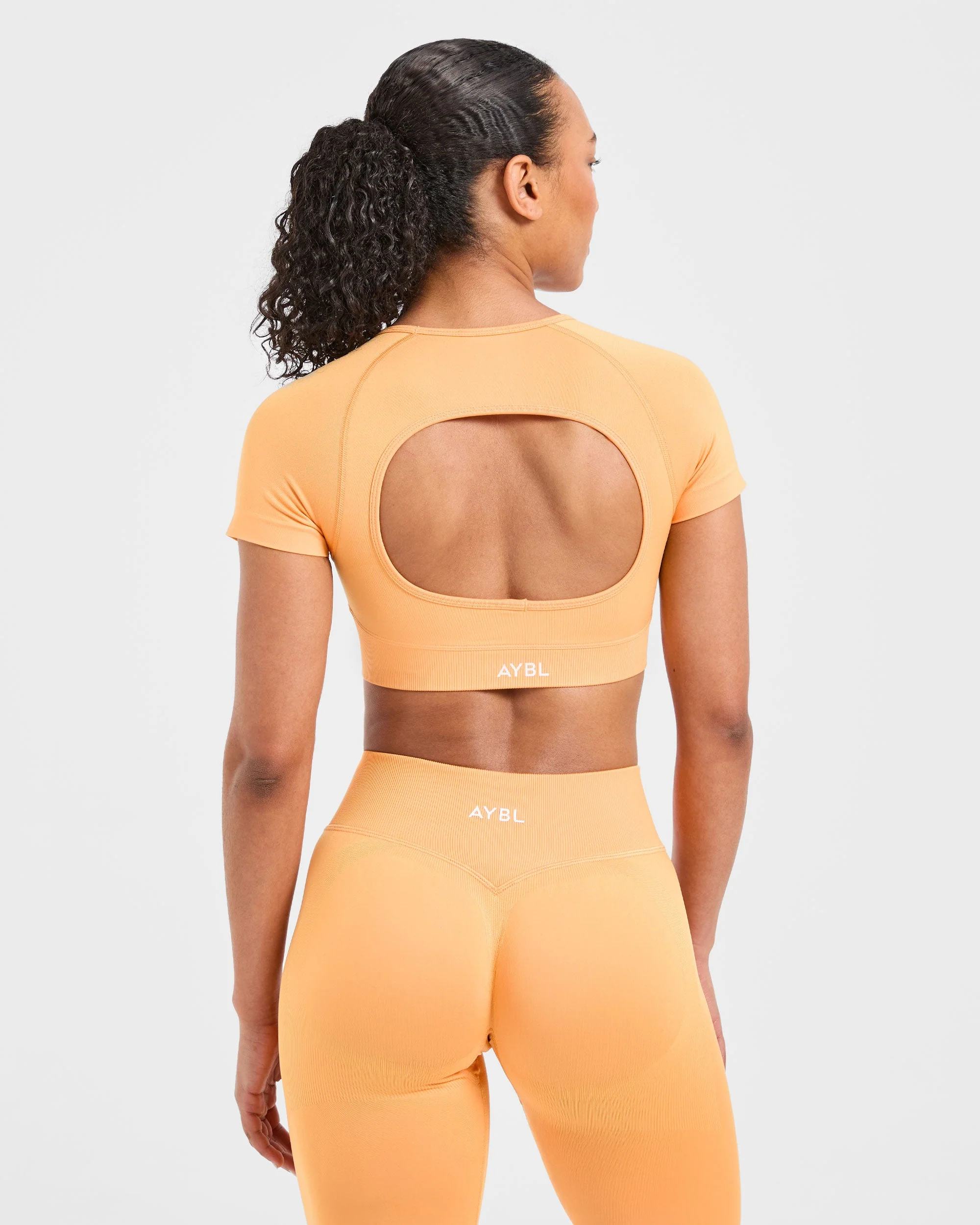 Adapt Seamless Crop Top - Bright Orange - Image 2
